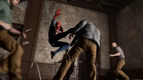 Spider-Man kicking a regular man in his face