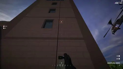 BattleBit Remastered gameplay showing a rope gadget that can be used to climb buildings