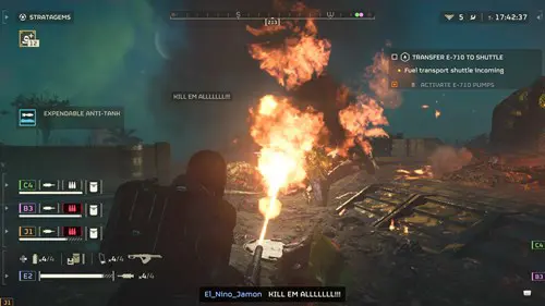 a helldiver burining a terminid with a flamethrower and yelling kill them all. a true patriot