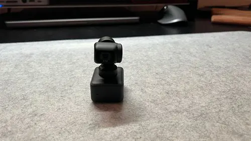 Insta360 Link on reviewer's desk