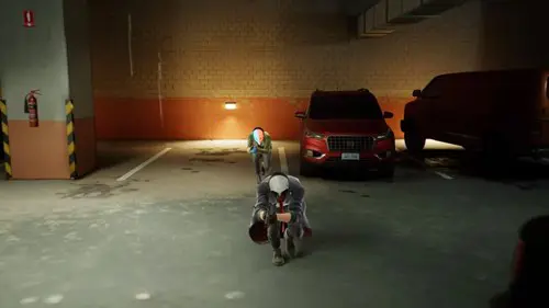 Joy and Wolf sneak through a car park in PAYDAY 3