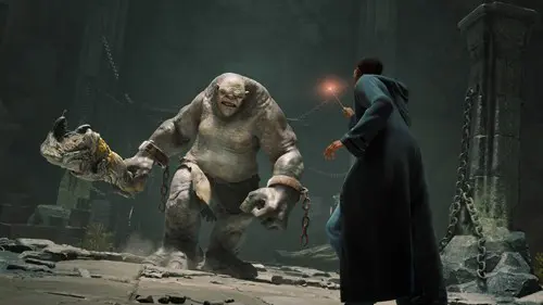 Key art of a wizard fighting a troll in Hogwarts Legacy