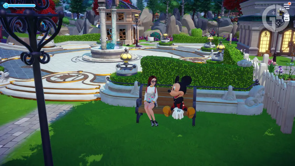 Mickey sitting on a bench in Disney Dreamlight Valley