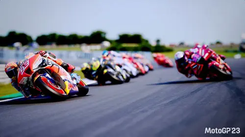 Riders in MotoGP tackling a corner at speed